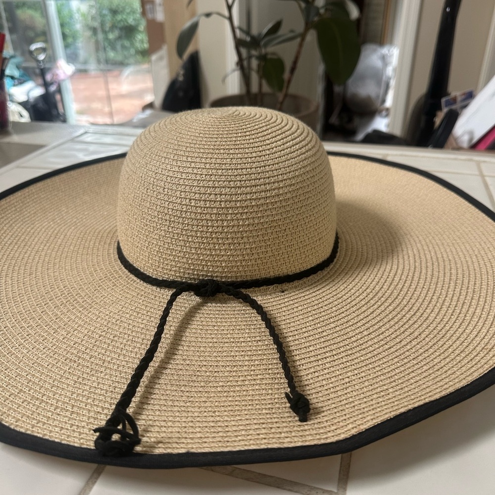 Elegant Tan Wide-Brim Hat with Black Trim
